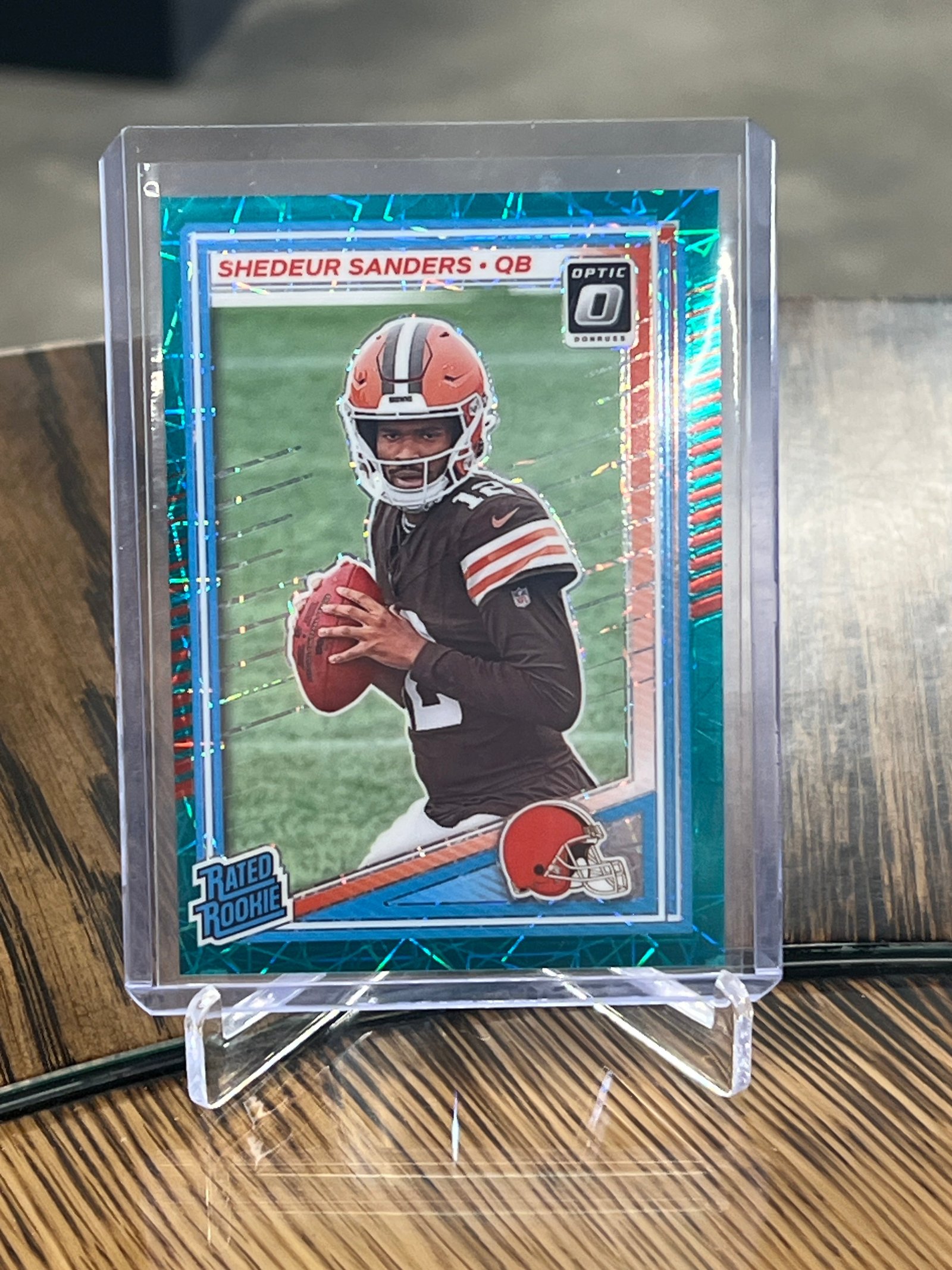 2289DD74-0350-4D92-834A-B36CF4F3B248 Shedeur Sanders 2025 optic teal velocity SSP rated rookie c hit SP RC #203 - Image 1