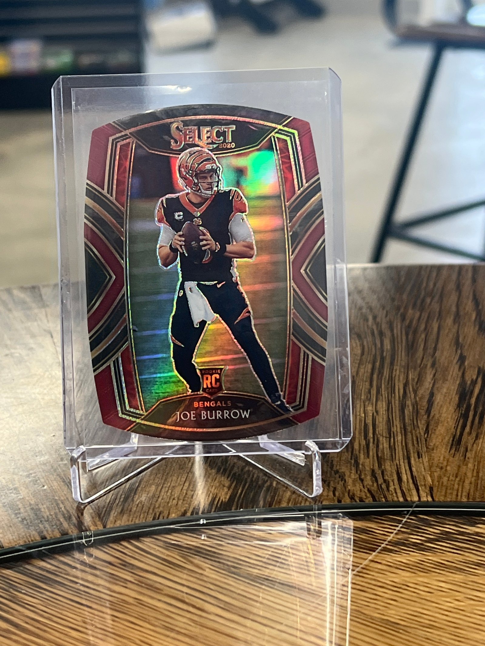 304B0E30-CF4E-4368-B73E-E6DD0207DFA2 Joe Burrow 2020 Panini Select - Club Level #246 Red Prizm Die-Cut (RC) - Image 1
