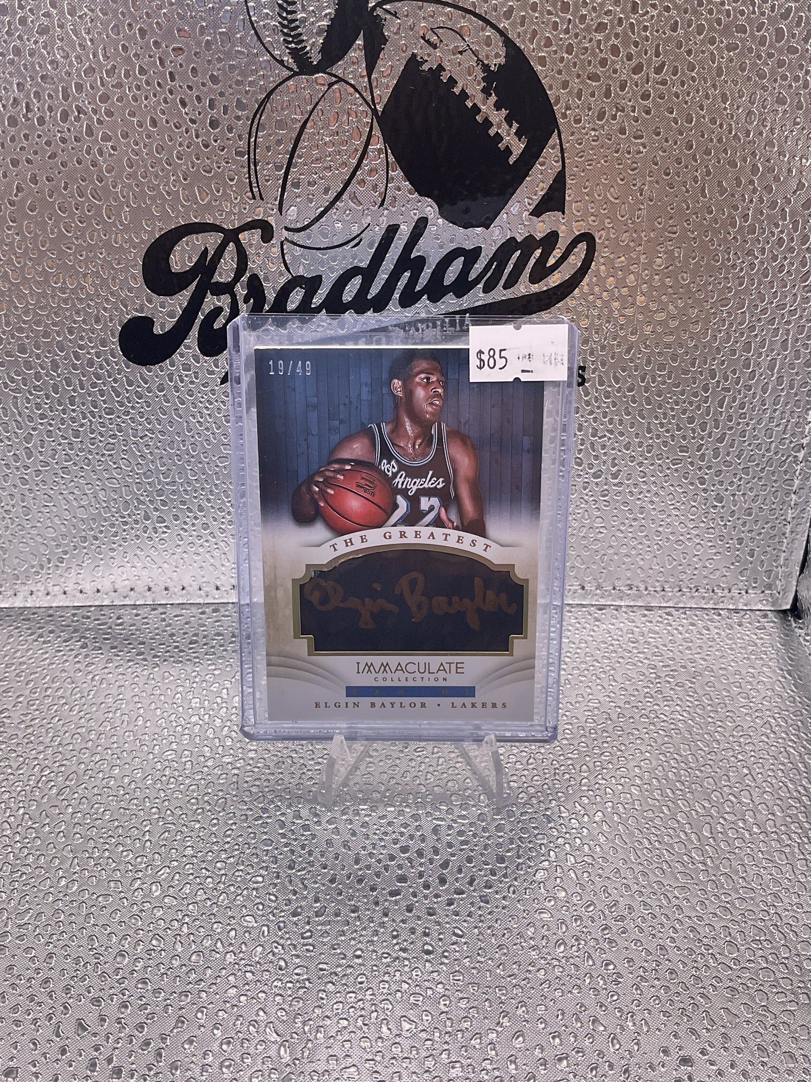 71408052-F635-455C-ADE1-2D82AE8FC987 2013-14 Panini Immaculate The Greatest
16/49 Elgin Baylor #28 Auto HOF - Image 1