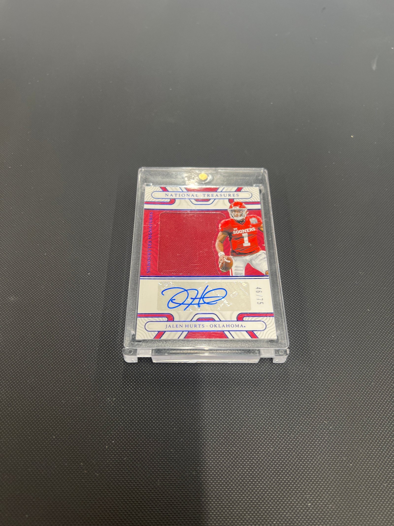 7C9EBC81-FFA8-497E-B22B-C5FD17FDE885 2022 Collegiate National Treasures Jalen Hurts Patch Auto Blue 46/75 - Image 1