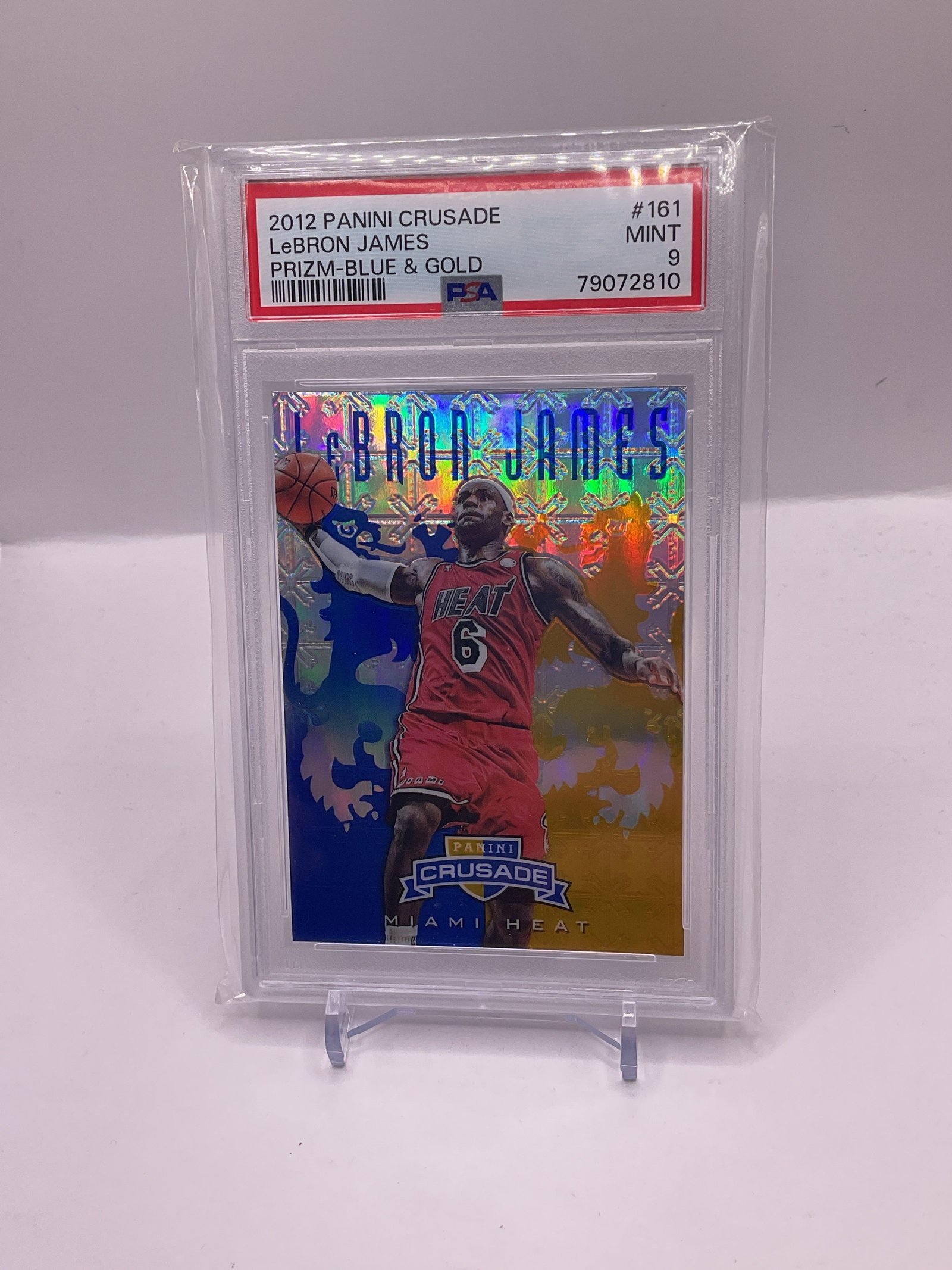 8AF96985-91C1-42B6-9794-0BE1490AAFA1 LEBRON JAMES PSA 9 2012-13 PANINI CRUSADE #161 BLUE & GOLD PRIZM MINT HEAT 4537 - Image 1