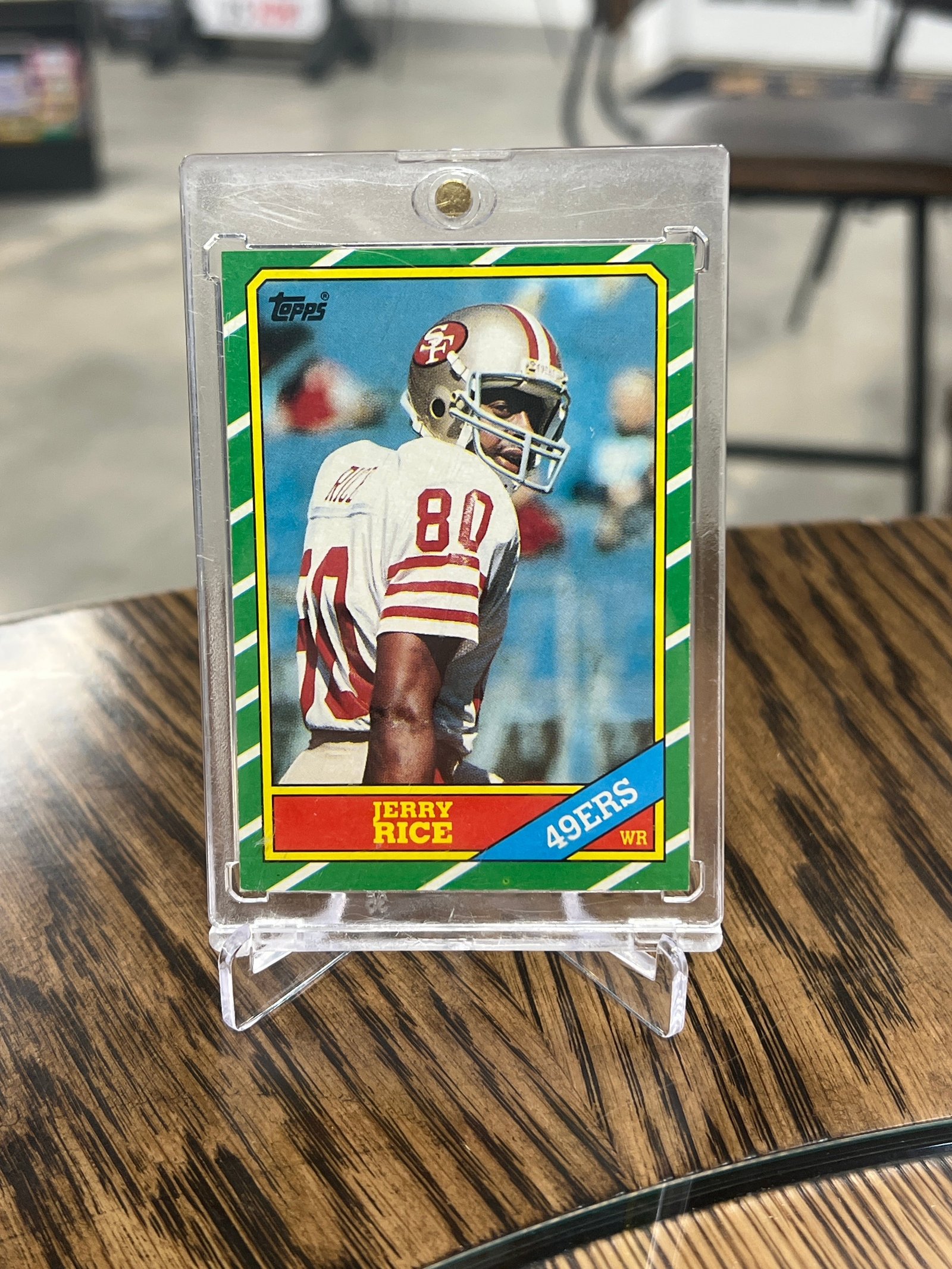 C28B18B7-704B-4E83-8494-67D3C1EFA60A Jerry Rice 1986 Fleer Football #161 San Francisco 49ers RC Rookie HOF - Image 1