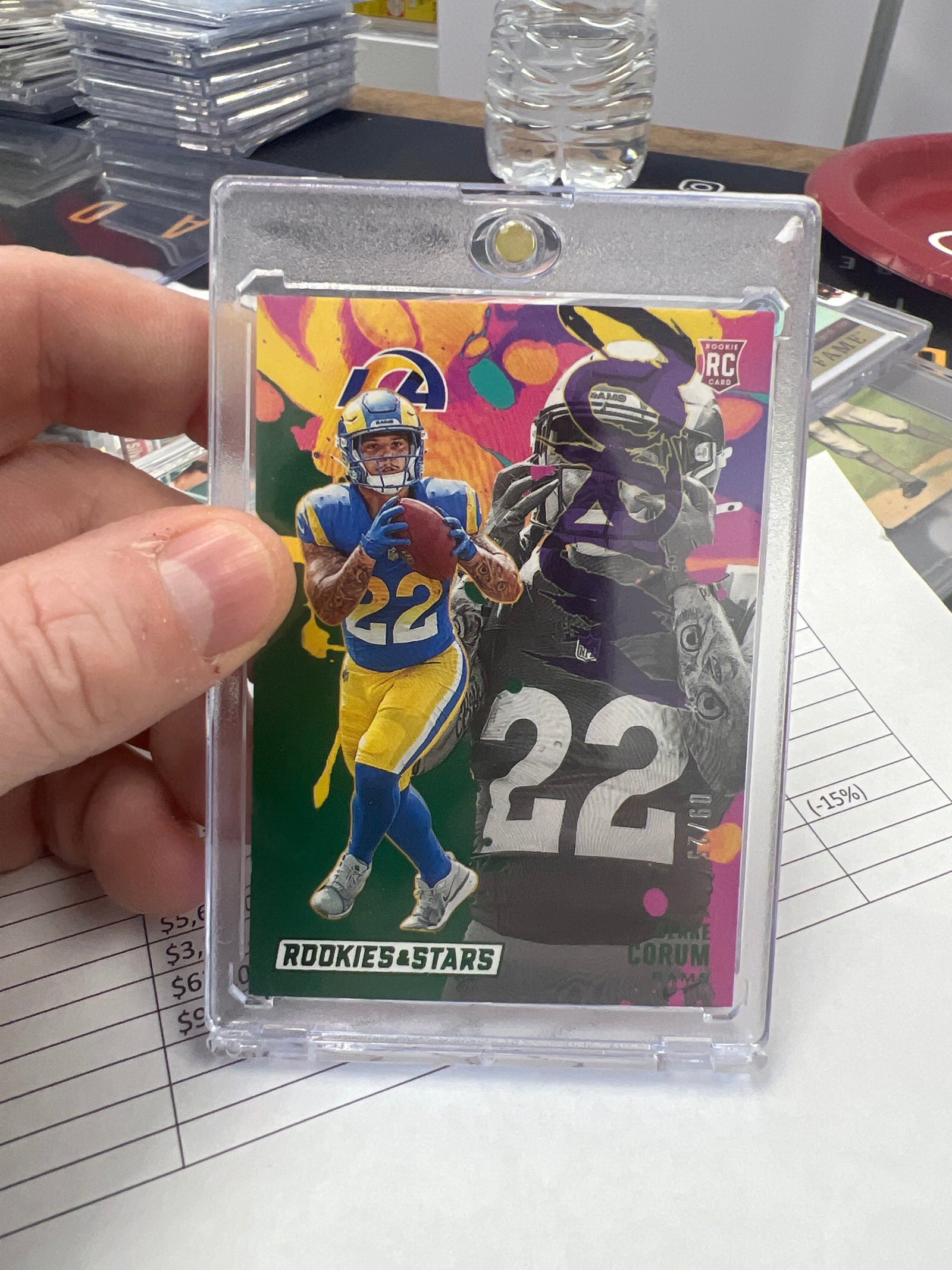 D5CF3F24-0586-4984-BC31-BBFEF517B0F6 2024 Panini Rookies Stars Rookie Exclusive Blake Corum #RE-BCM PURPLE 09/25 (RC) - Image 1