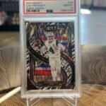 Dak Prescott 2024 Panini Select #125 Zebra Prizm Shock SP PSA 10