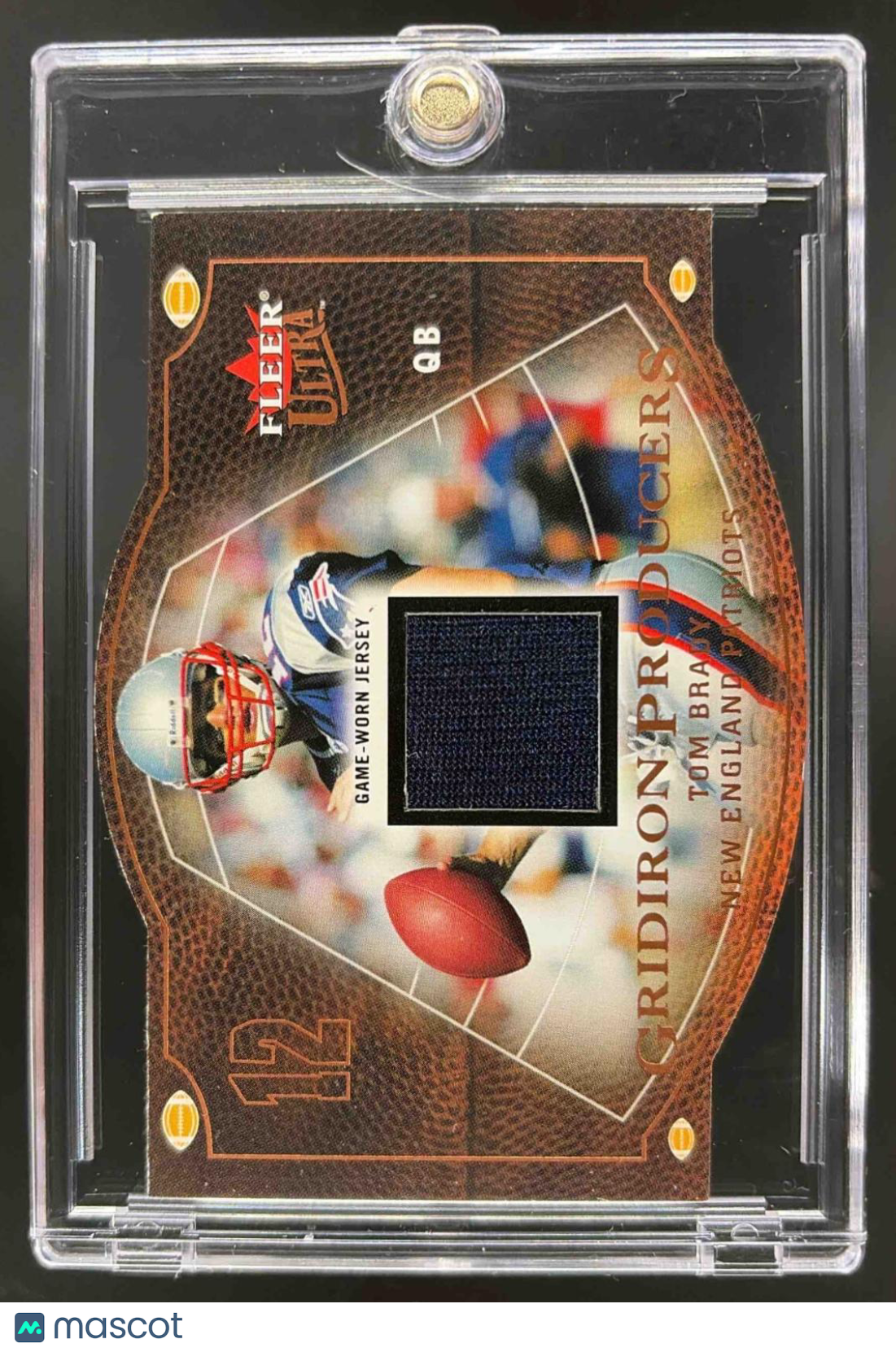 front-watermark-raw-V2_7f09b813-ab16-4fc0-af59-36c43a96e71d 2004 Fleer Ultra Tom Brady #GP/TB Gridiron Producers Game Used Relic - Image 1
